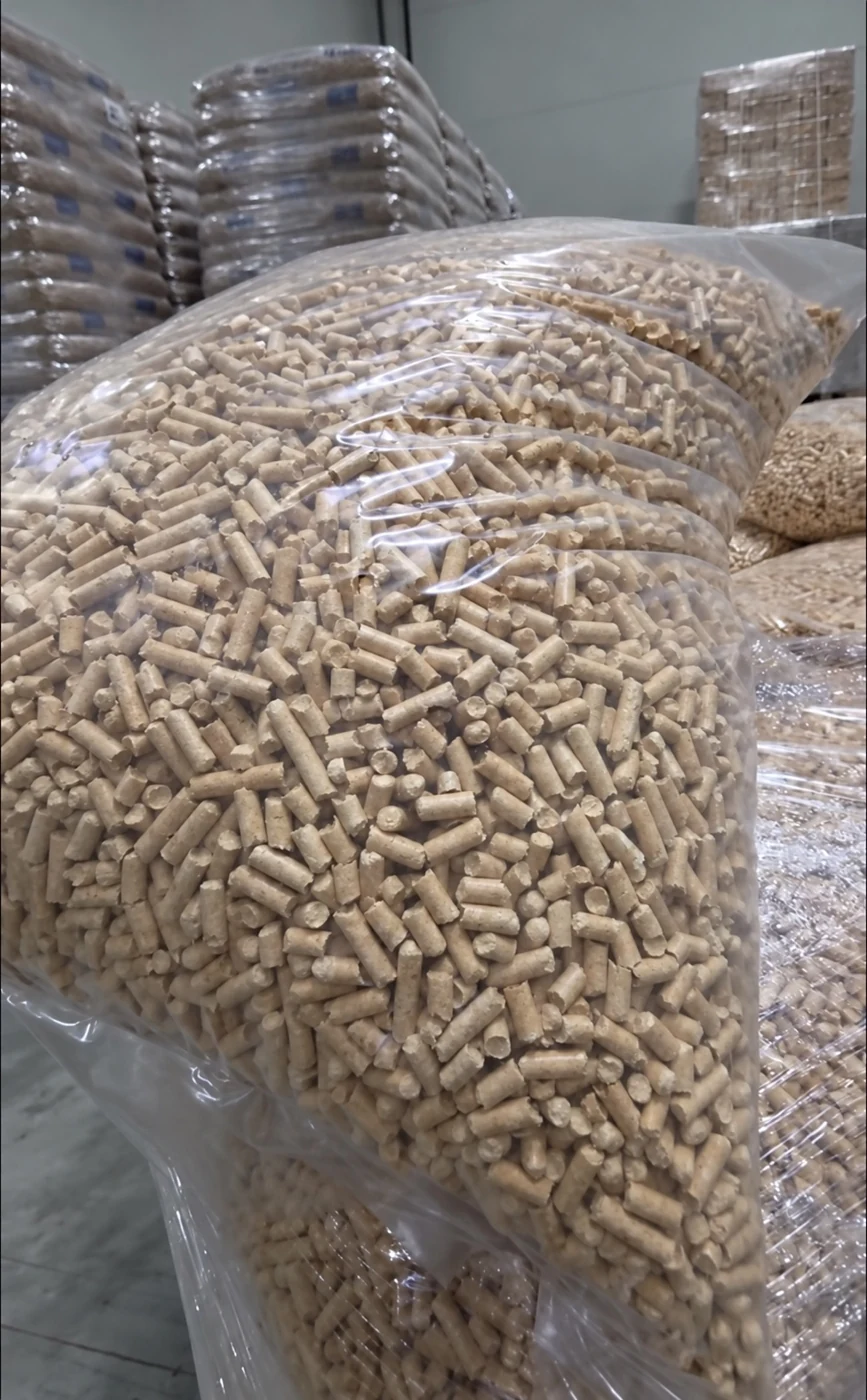 Close-up of wood pellets visible through a clear bag